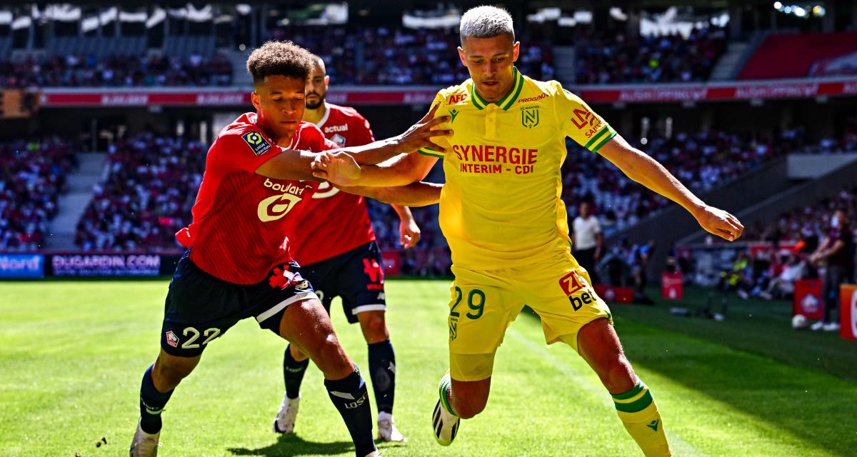 Quentin Merlin (FC Nantes) au duel avec Thiago Santos (LOSC)